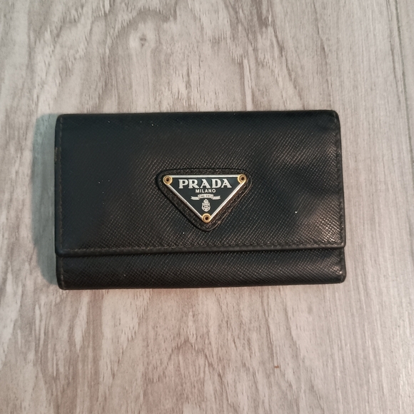 Prada Handbags - PRADA triangle Plate Tri-fold 6 rows Key Case